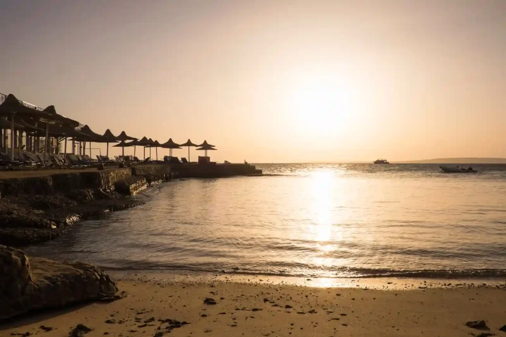 Golden sunset over Abu Soma Beach on Egypt's Red Sea coast, one of the best things to do in Abu Soma is enjoying the scenic beachfront views.