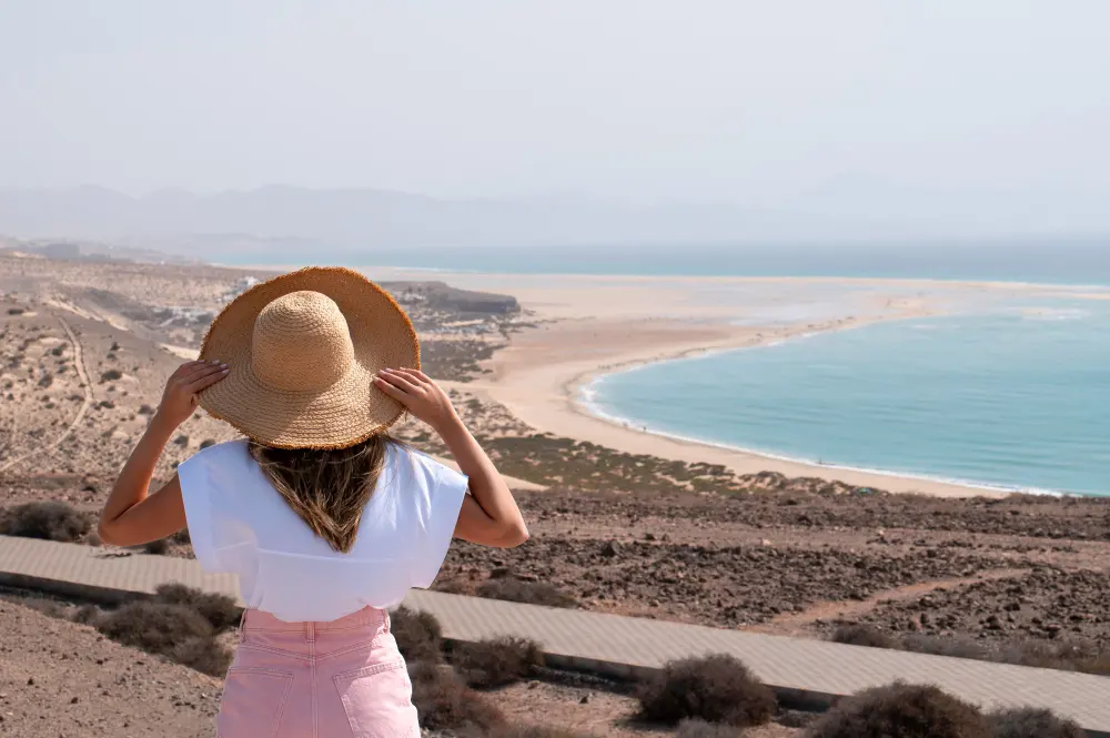 Traveler overlooking Abu Soma Beach near Safaga on a sunny day, ideal for a Red Sea holiday